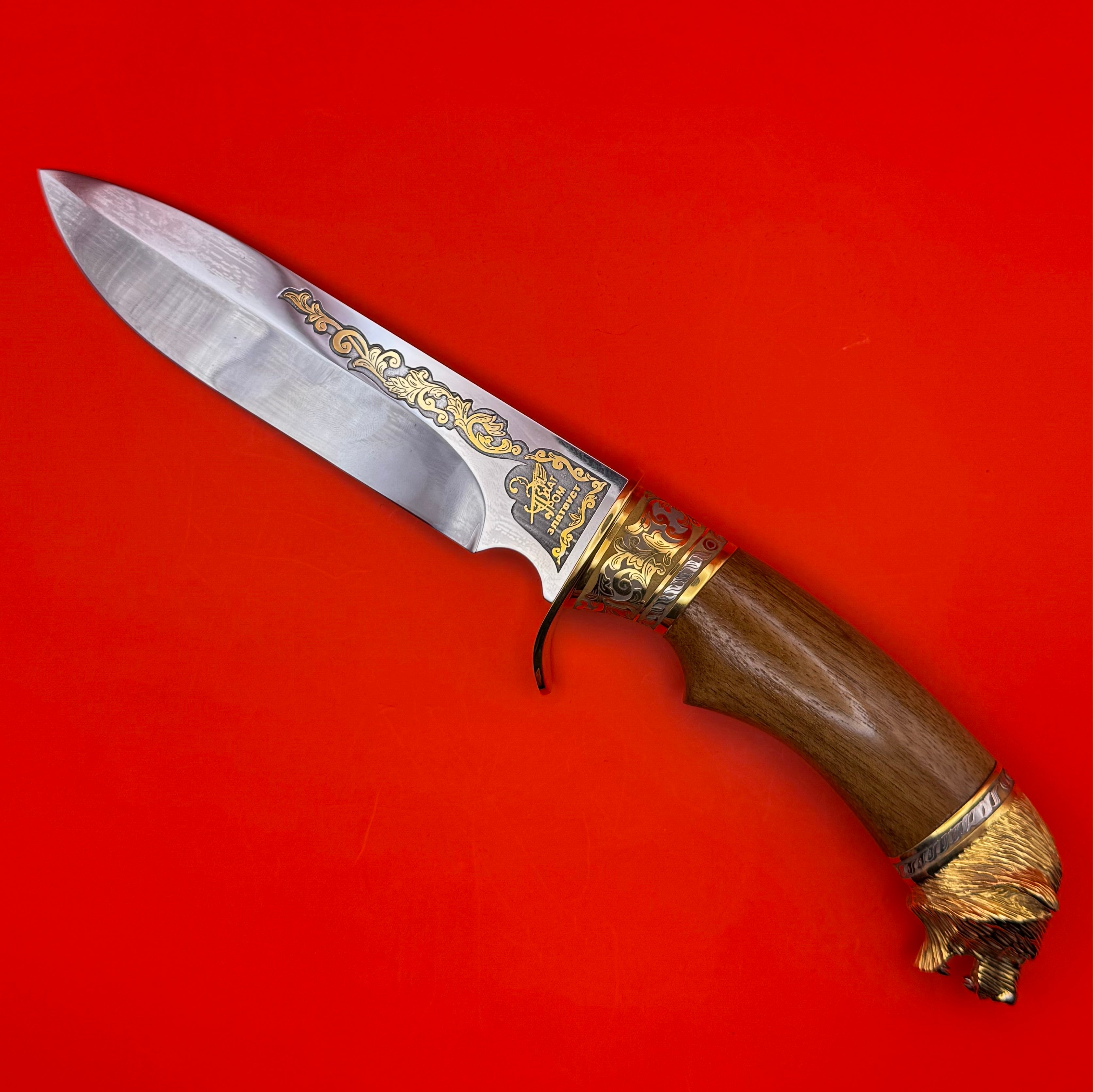 Ornate Russian collector’s knife with Damascus steel blade and intricate gold hunting scene engraving
