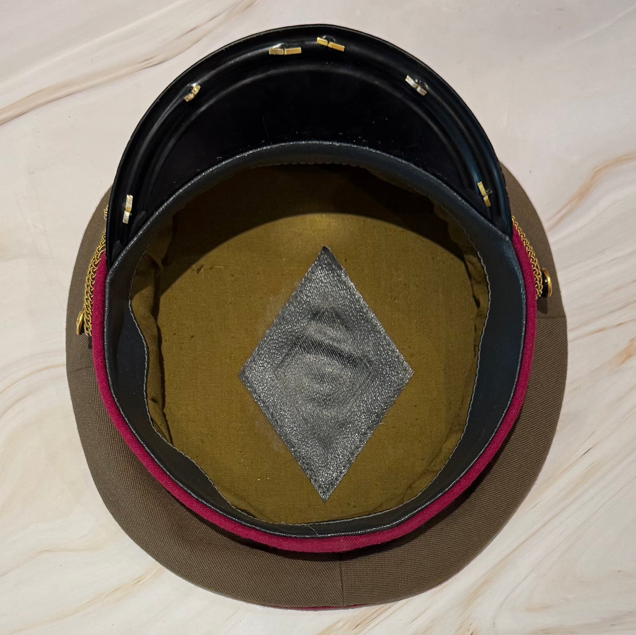 Interior label and construction of Mongolian Cold War military cap of 1960s