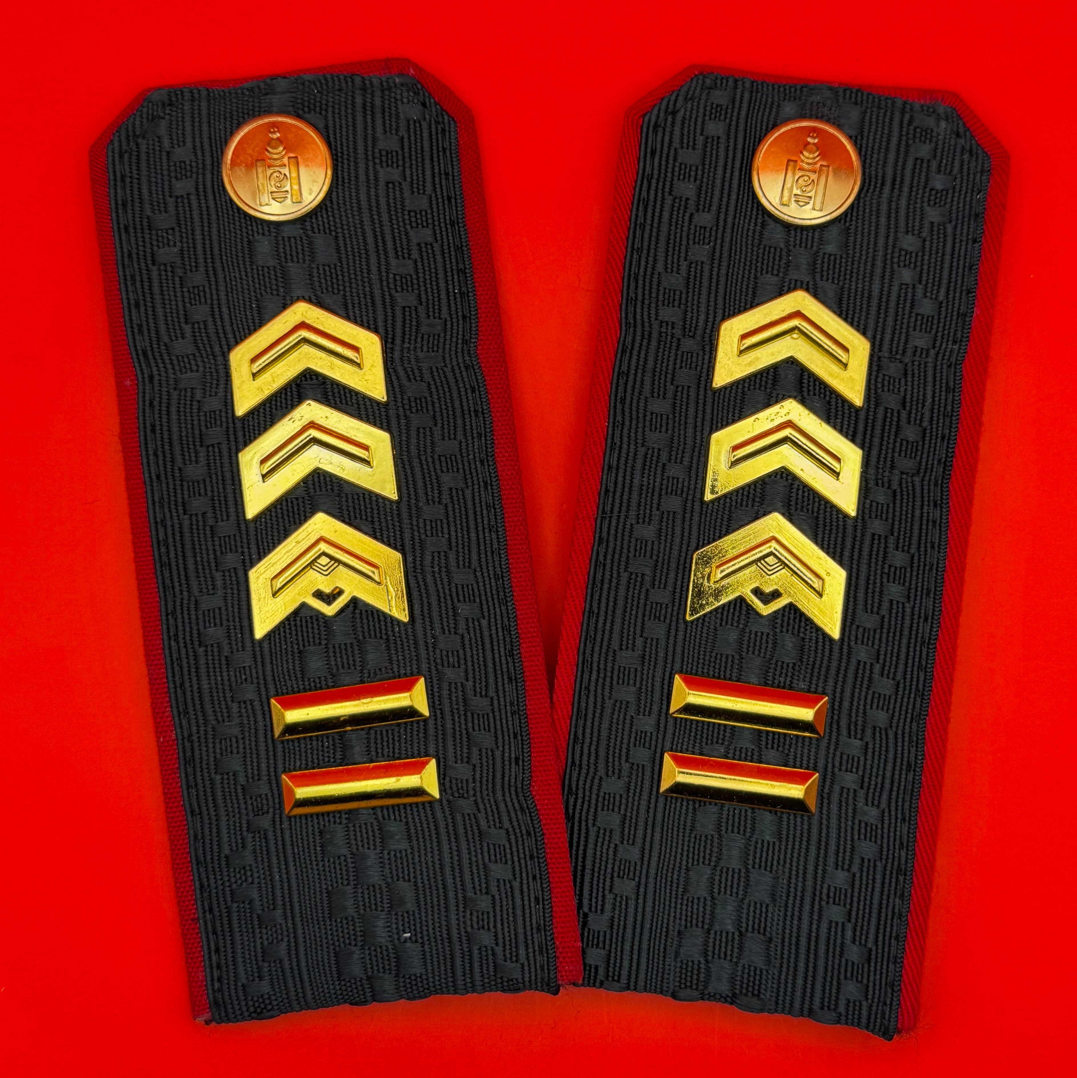 Pair of Mongolian Army Sergeant Major shoulder boards with gold chevrons and red accent stripes