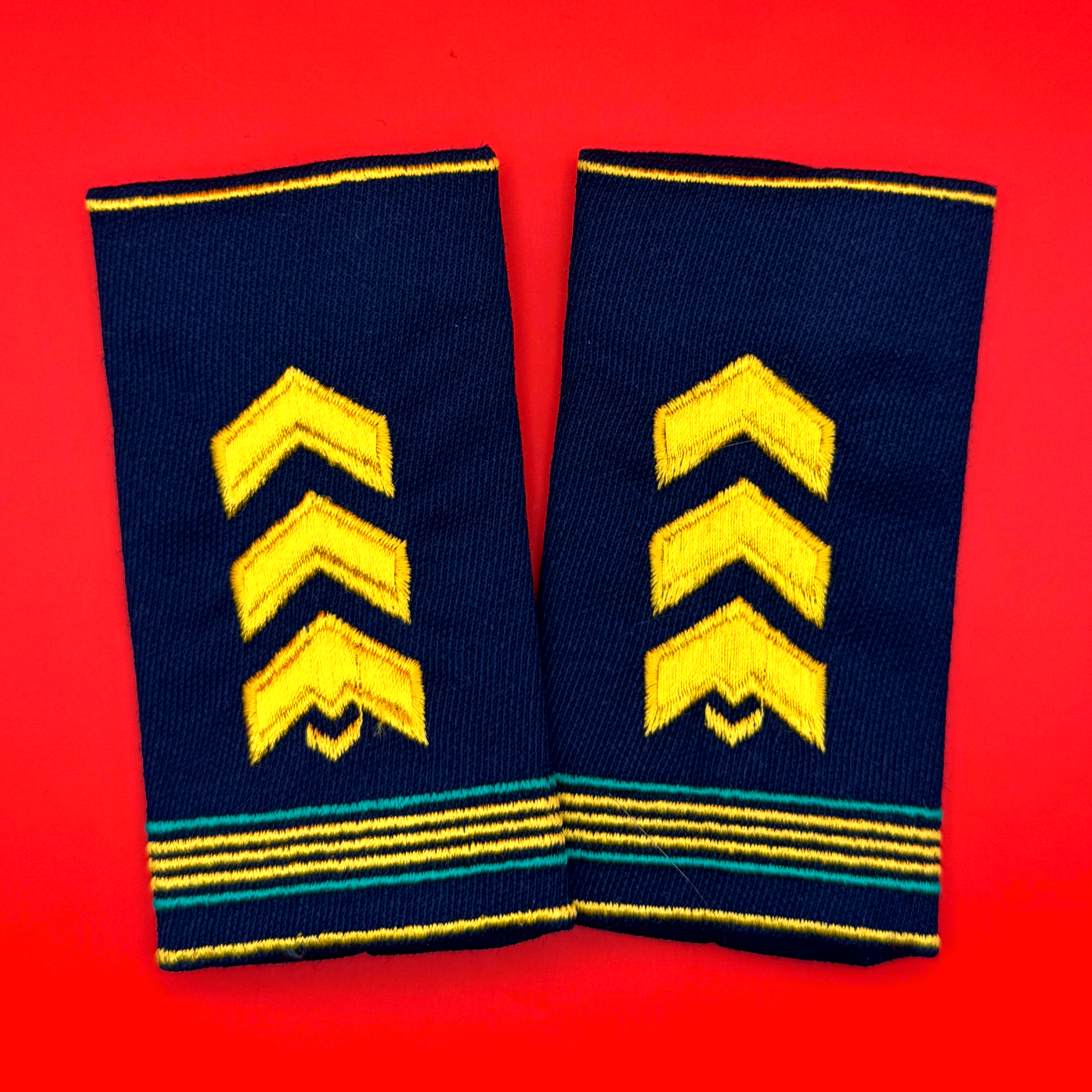 Modern Mongolian Border Guard Senior Sergeant shoulder boards with yellow chevrons on blue fabric