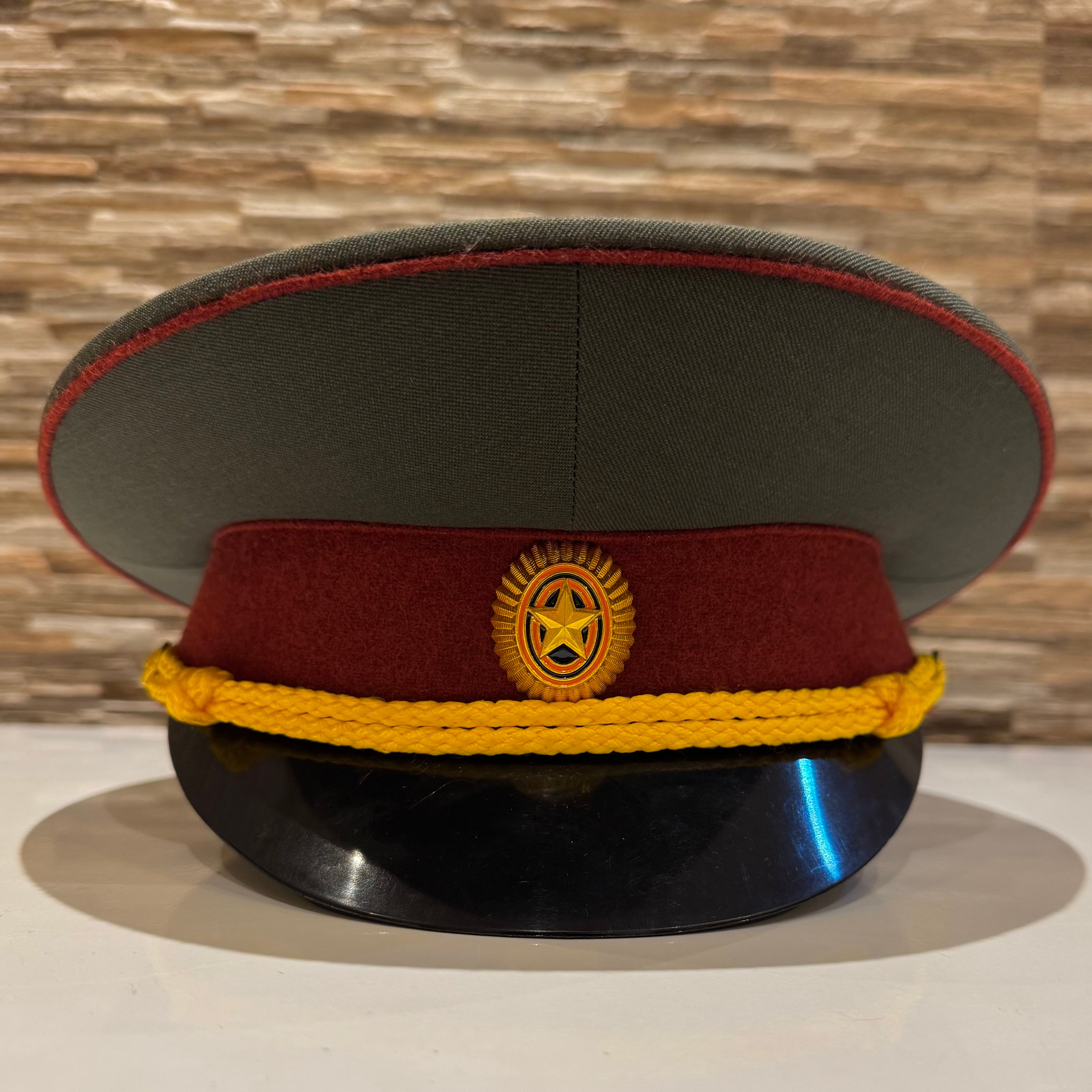 Russian Internal Troops officer visor cap with maroon band, gold cord, and official emblem – size 58, new condition